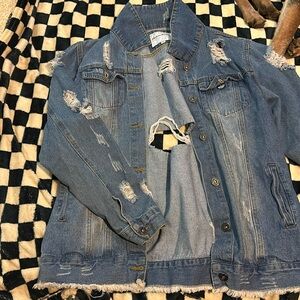 Distressed denim jacket